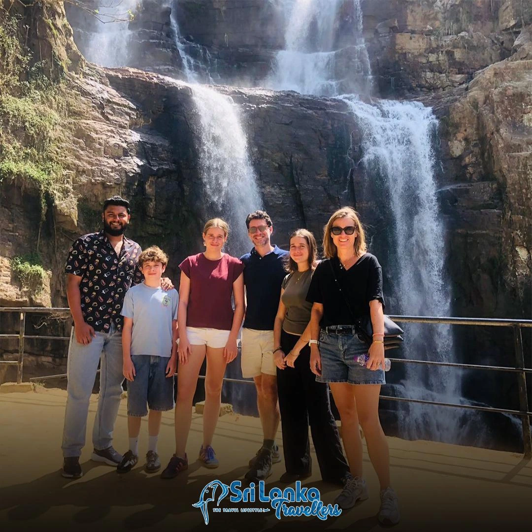 Family at a waterfall during a Sri Lanka holiday