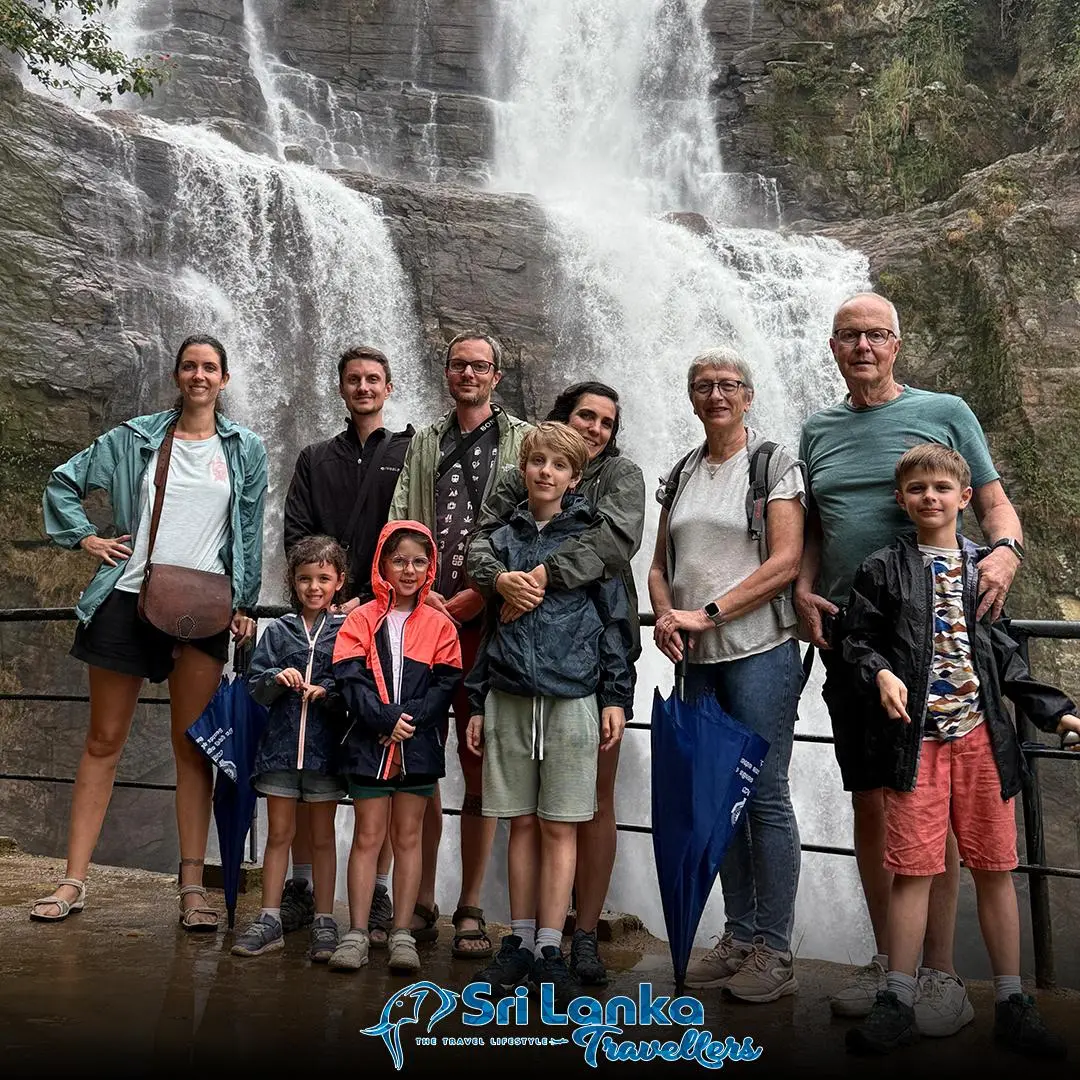 Guests at a waterfall on a Sri Lanka tour